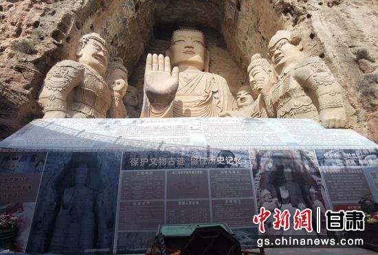 時下，中國“石窟鼻祖”天梯山石窟第13窟大佛足部與局部危巖體搶救性保護項目正在施工。圖為施工現(xiàn)場。陳曉斌 攝